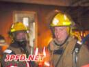 FF. Scott (left) and FF. Todd (right) pose for a picture during overhaul operations.