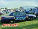 This picture shows the New Orleans Harbor Police in the foreground, the Harahan Police SUV in to the right,middle of the picture, and the tail end of the New Orleans Police mobile command unit to the right, background of the picture.